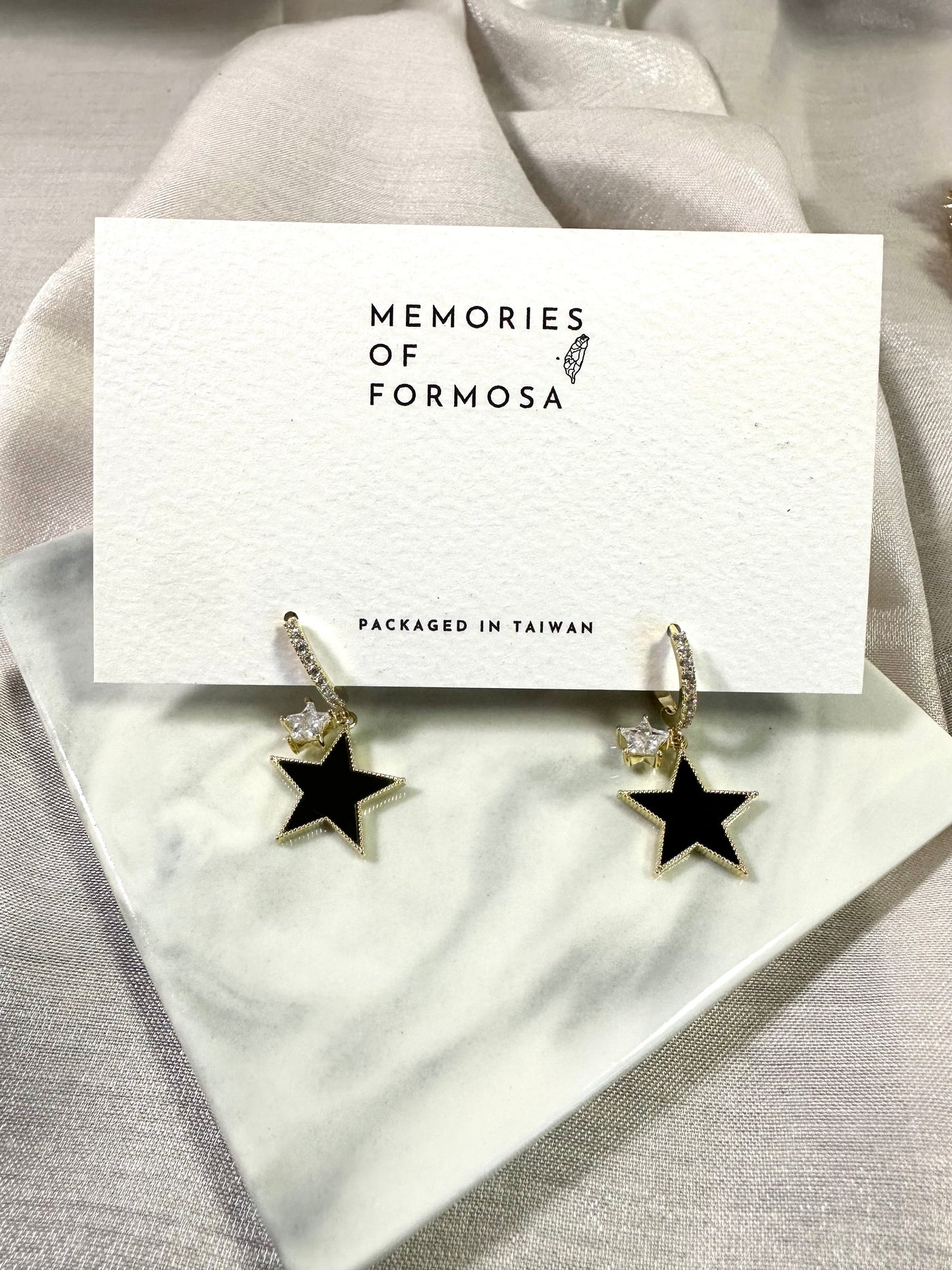 Dangly star earrings